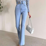 Light-colored Flared Jeans Trousers - WOMONA.COM