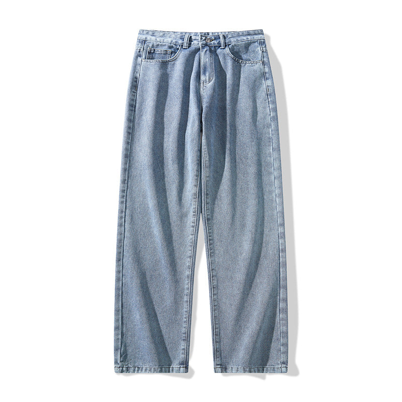 Washed blue wide-leg denim trousers with loose fit and belt loops