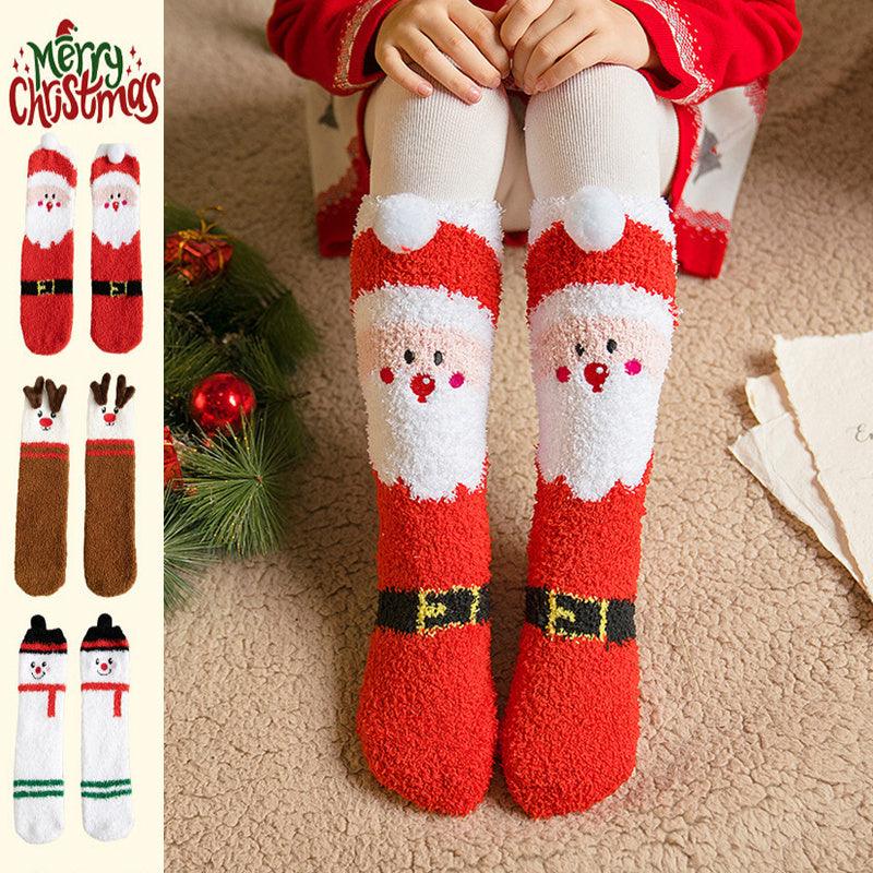 Child Christmas socks, red and white with Santa face and black hat trim
