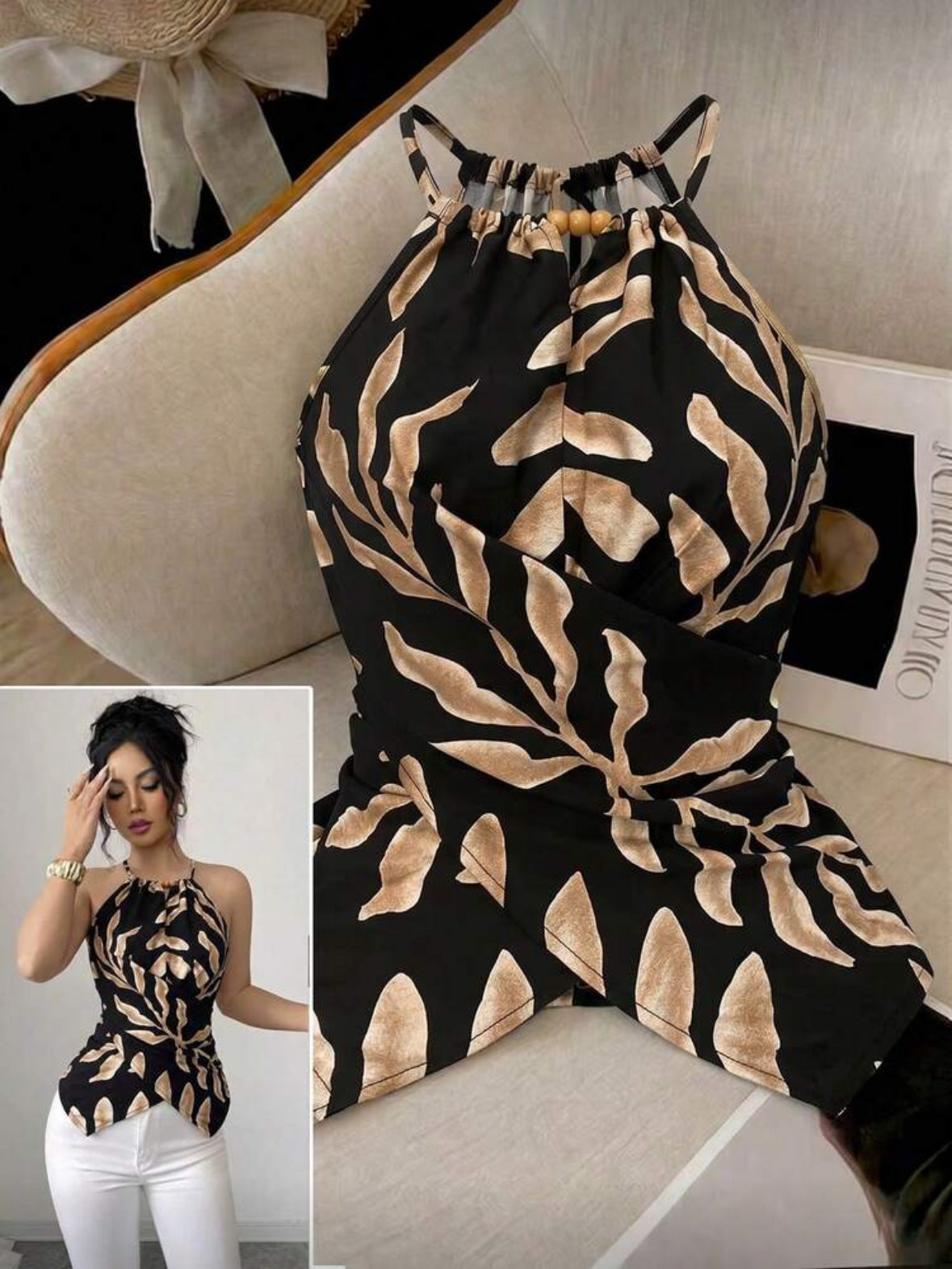 Black sleeveless top with tan leaf print, gathered halter neckline and tie waist