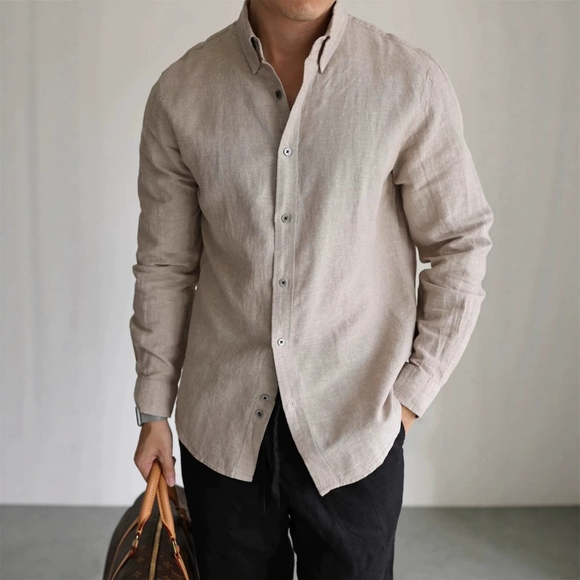 Khaki men’s long-sleeve dress shirt, button-front and spread collar