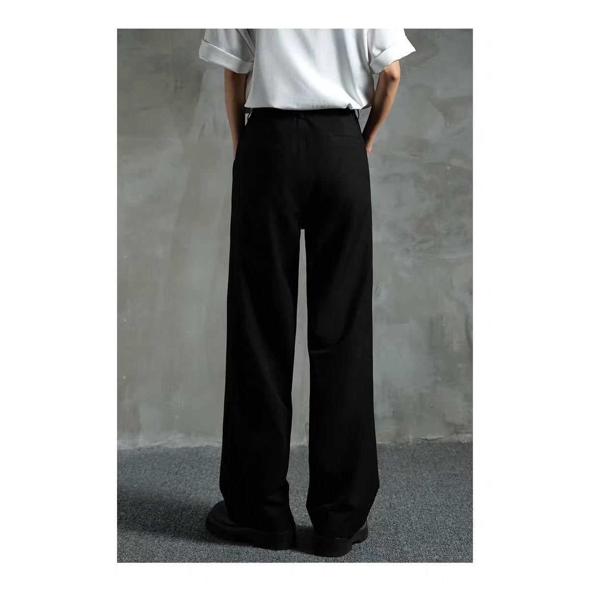Men's black suit pants with crease front and relaxed wide straight legs