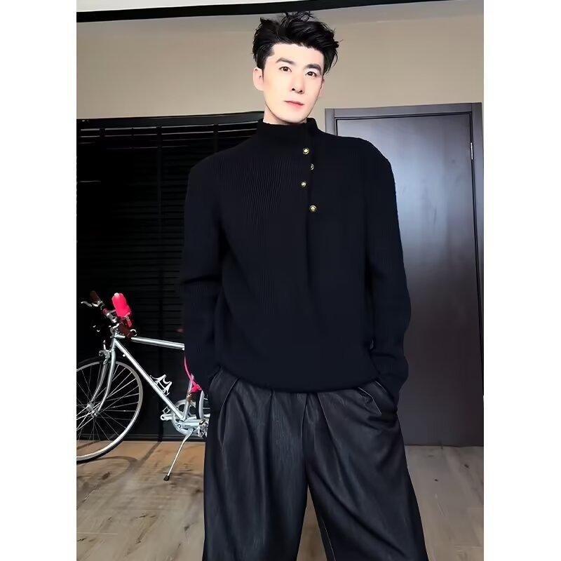 Men's black knit sweater with stand collar and brass button placket