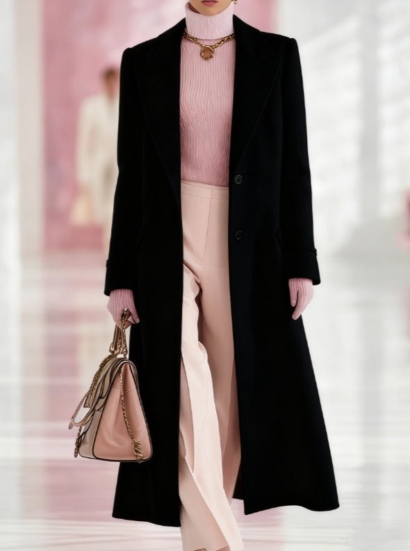 Long loose lapel coat in black with button front and notched lapels