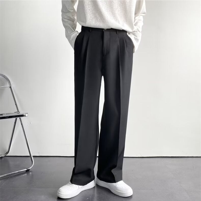 Men's dark straight-leg suit trousers with pleated front and belt loops