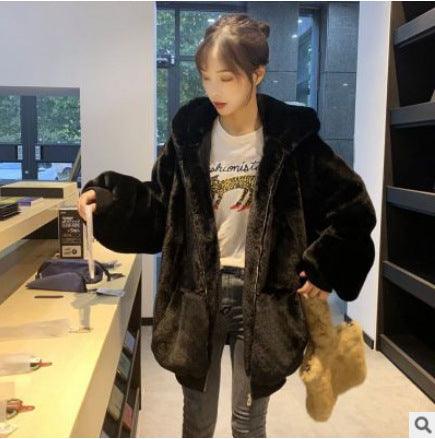 Women’s hooded fur jacket in dark brown, plush long-sleeve coat with raised hood