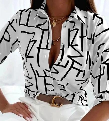 White button-up long-sleeve women's shirt with bold abstract black glyph print