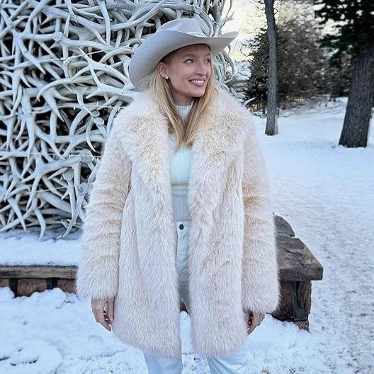 Cream faux fur coat with large lapels, button front, and long sleeves