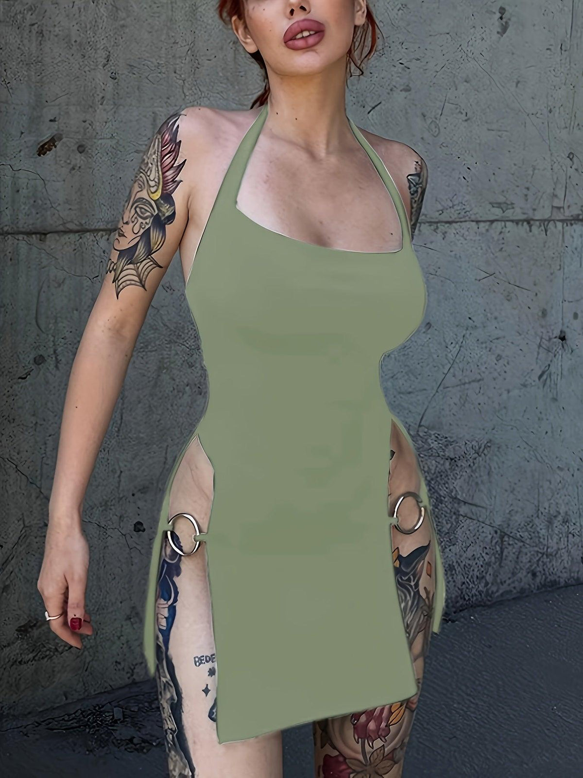 Olive green halter mini dress with side cutouts and metal ring details