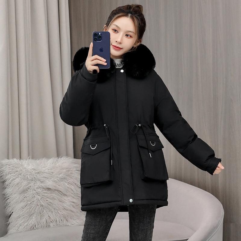 Black cotton-padded parka with faux-fur hood, zip front, and flap chest pockets