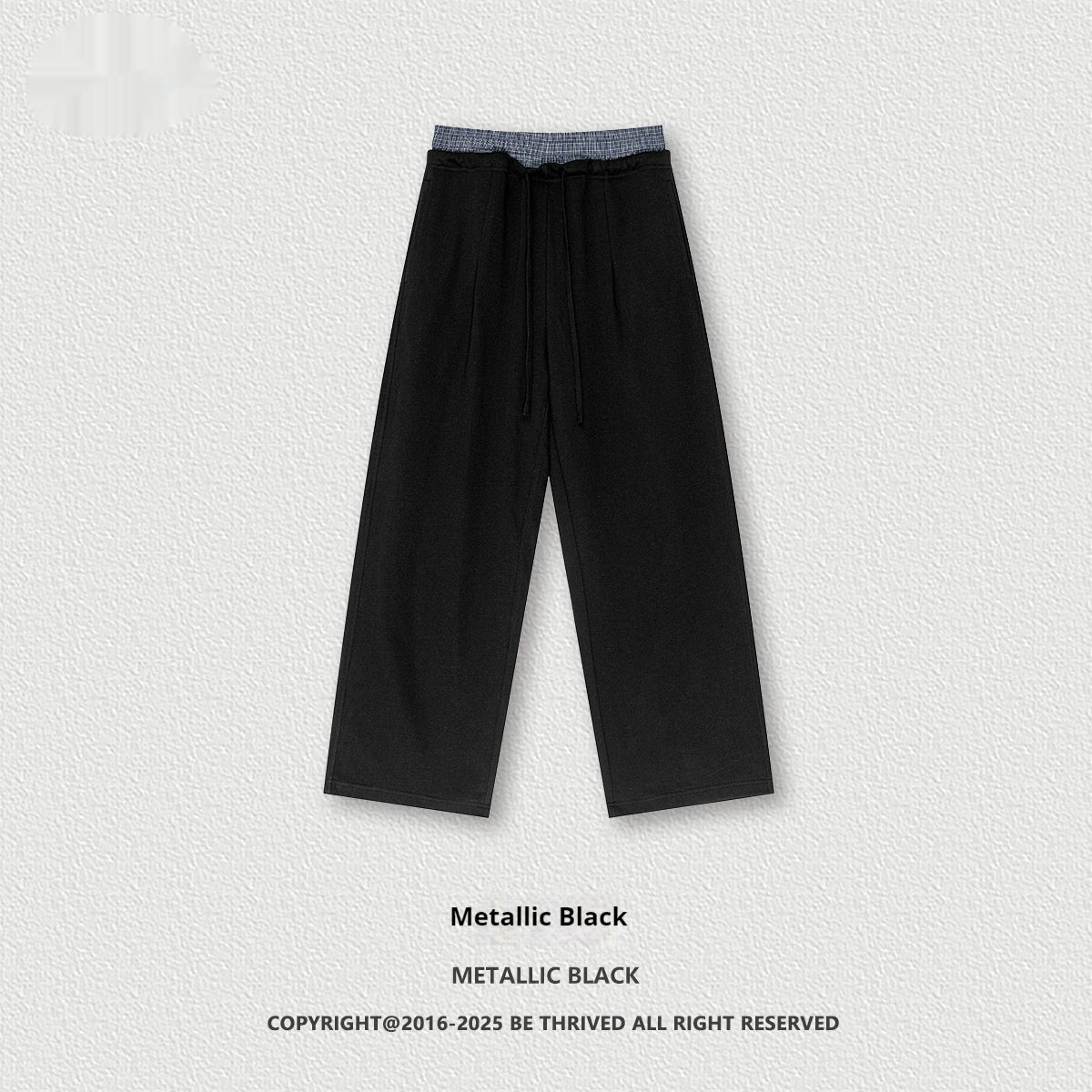 Metallic black wide-leg pants with elastic waistband and drawstring