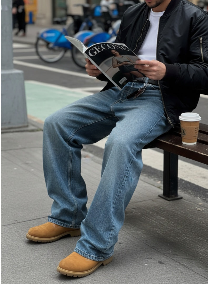 Light blue straight-leg denim pants with belt loops, fly, and back pockets