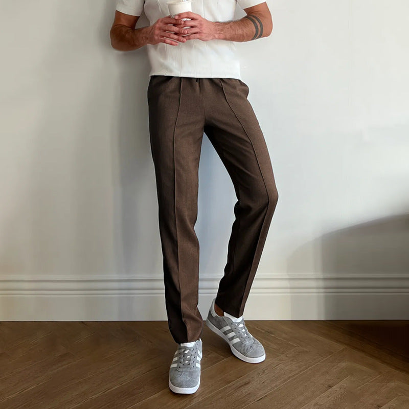 Men's pleated twill slim-fit tapered pants with elastic waist, brown