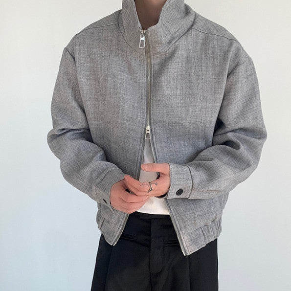Gray minimalist zip-up jacket with stand collar and snap cuffs