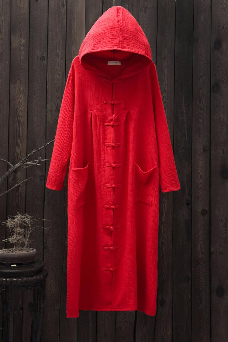 Red hooded cloak robe overcoat with long sleeves and central toggle-style fasteners