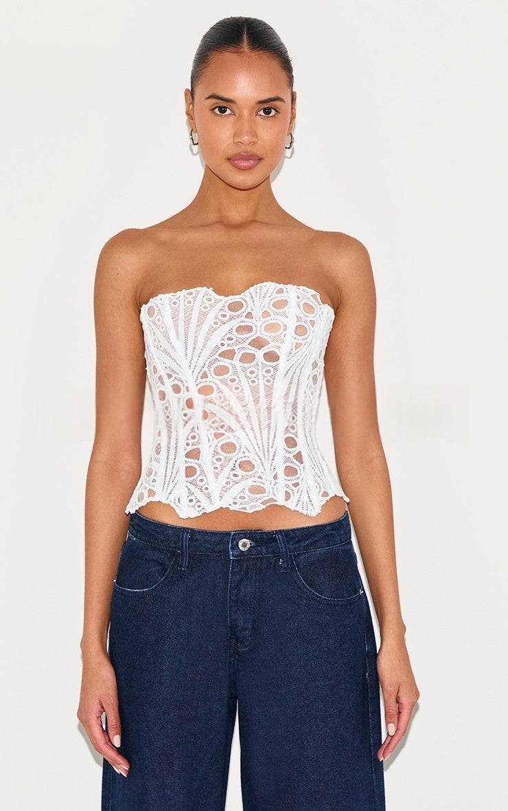 White lace-print strapless shapewear corset with dense circular eyelet pattern