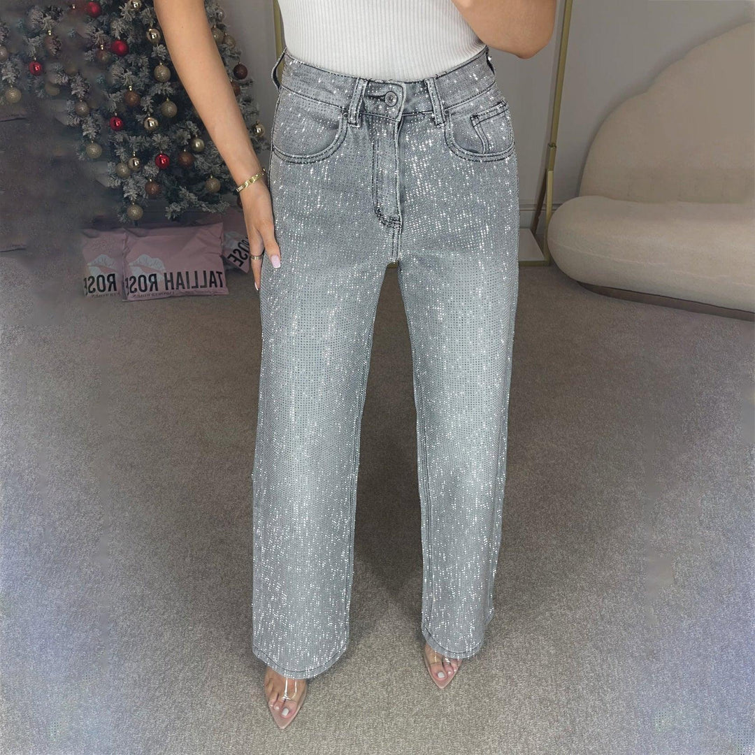 Women’s high-waist denim jeans in light blue with subtle sparkle speckle finish