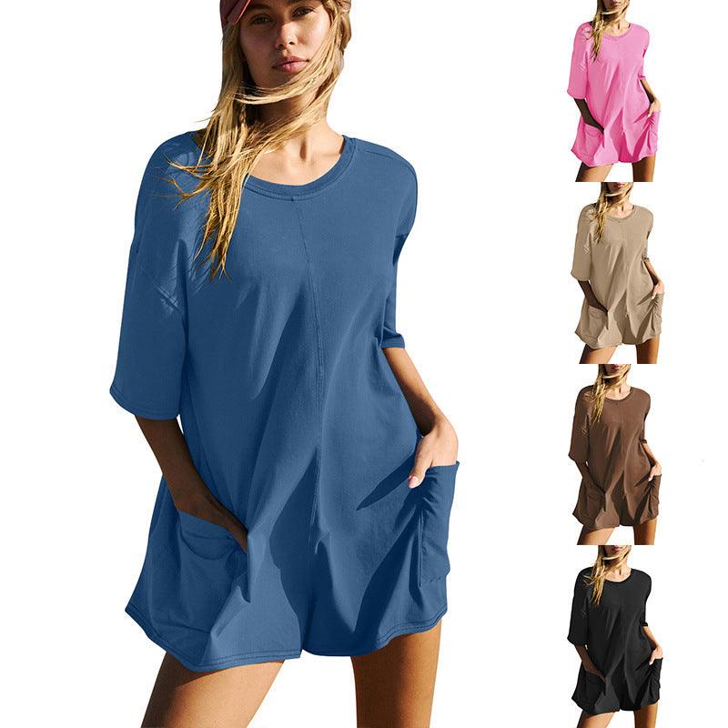 Blue loose short-sleeve jumpsuit with scoop neck and side pockets
