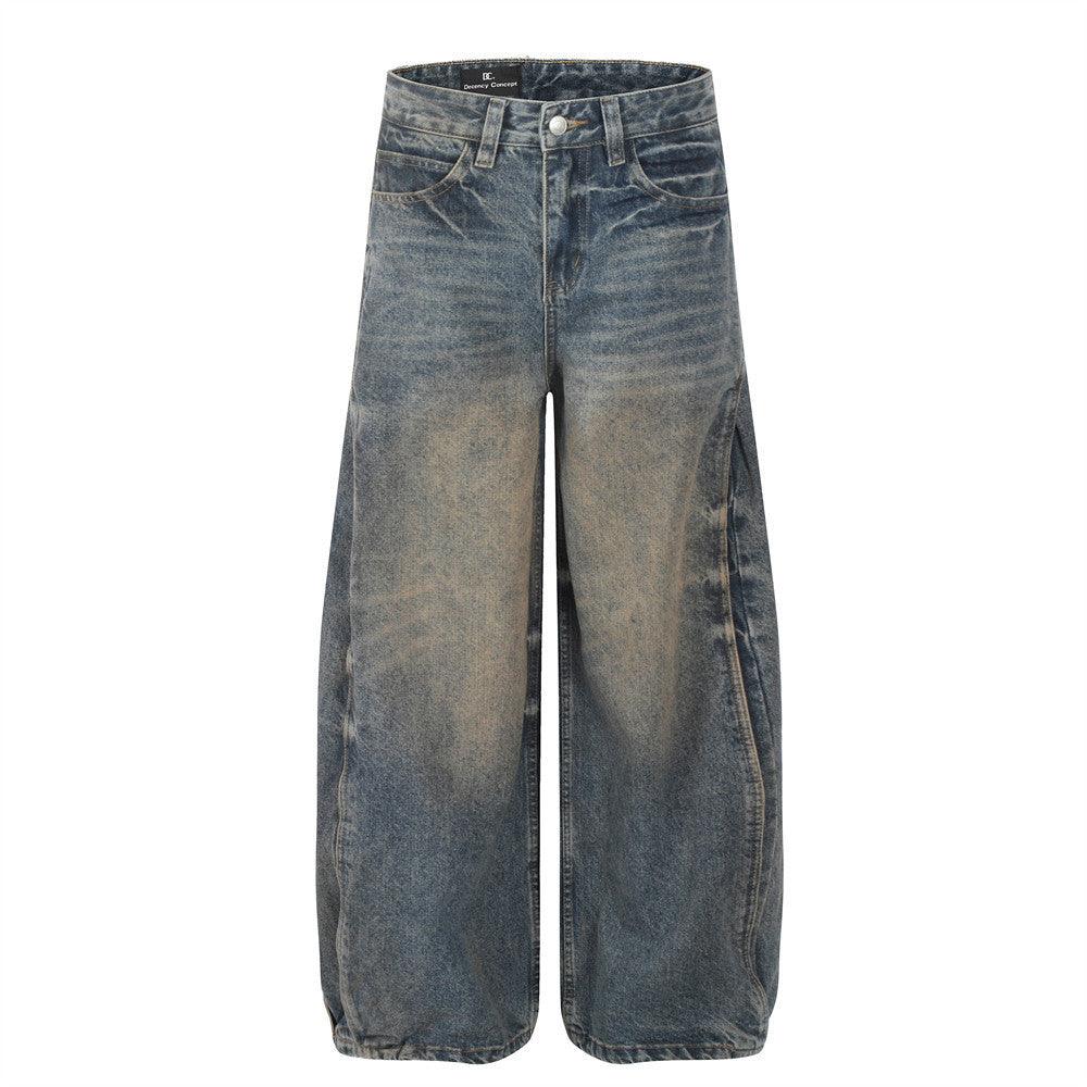 Blue washed denim wide-leg pants with side seam pockets and button fly