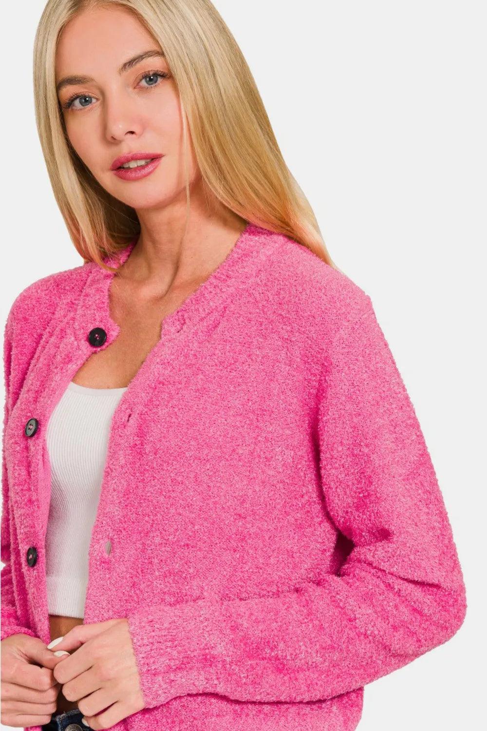 Fuchsia knit cardigan sweater with long sleeves and button-front opening