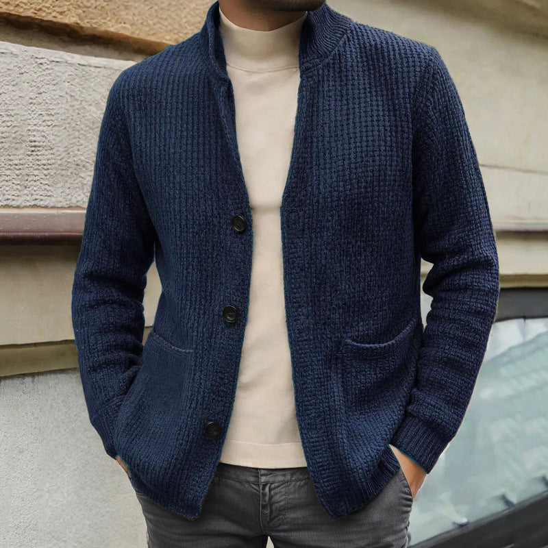 Mens mid-length knitted coat with stand-up collar, dark blue, button front and pockets