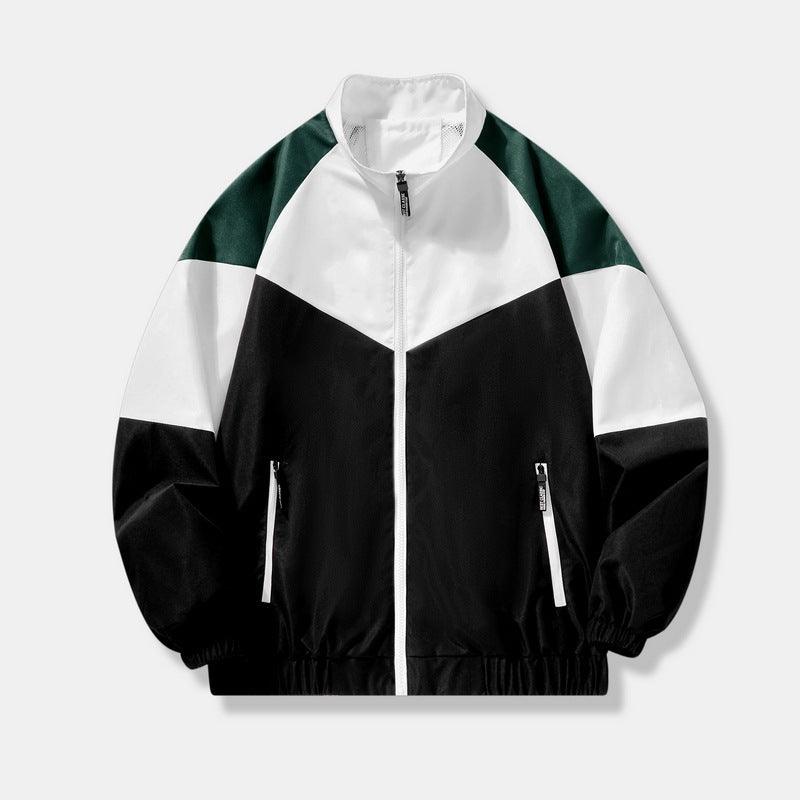 Boys color-block zip-up sports jacket in black, white, and dark green panels