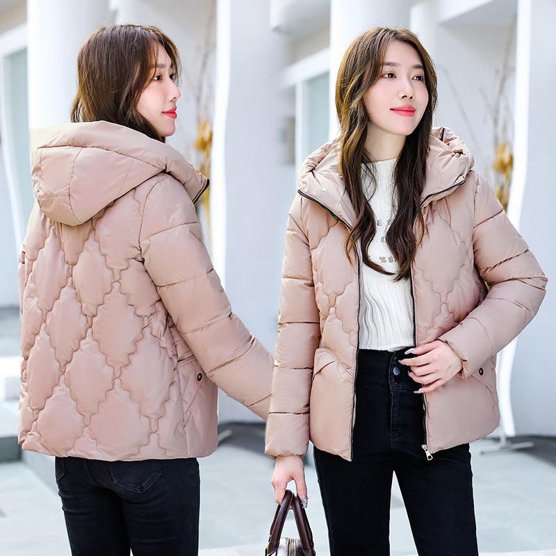 Light beige quilted hooded coat with full-zip front and patterned panels, side pockets