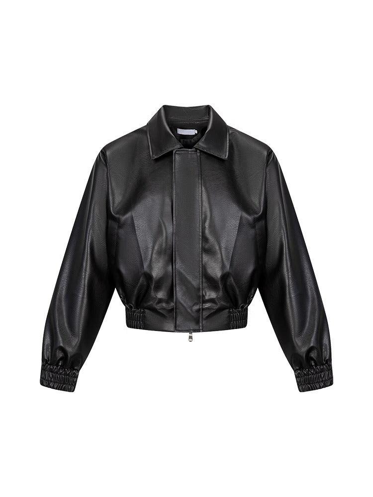Black PU leather short jacket with stand collar, center zip, elastic cuffs and hem