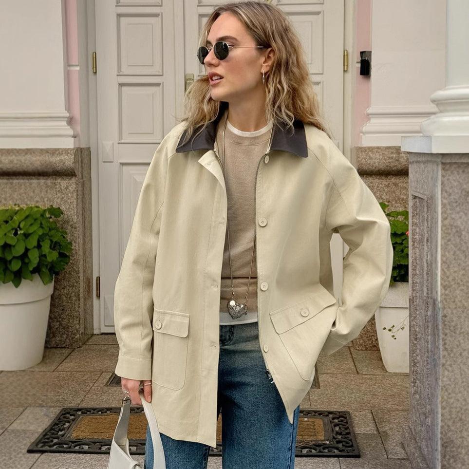 Beige cotton jacket with dark contrast polo collar, front buttons, chest pockets