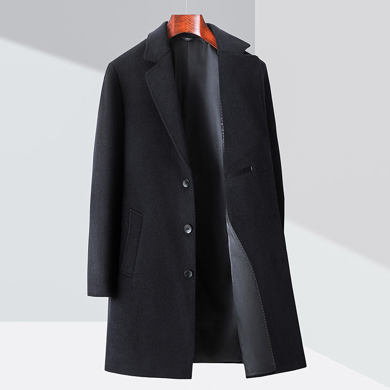 Men's dark charcoal wool trench coat with wide lapels, button front, and side pockets