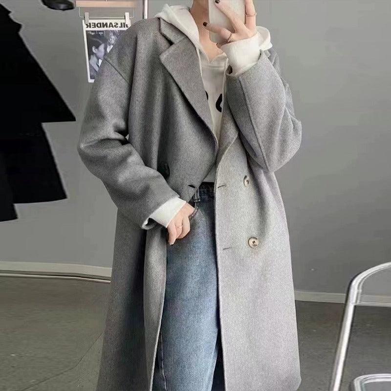 Women’s mid-length gray double-breasted wool trench coat with notched lapels