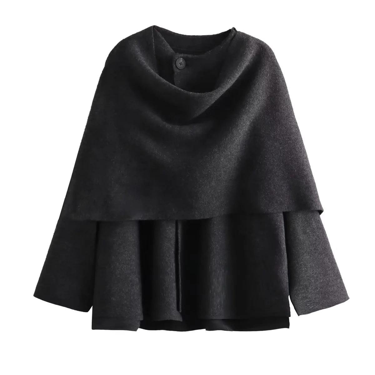 Dark gray knitted coat close-up: cowl scarf collar and buttoned neckline