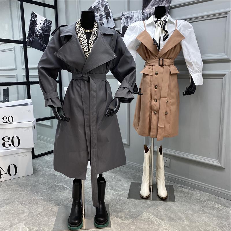Gray long belted trench coat with notched lapels and long sleeves