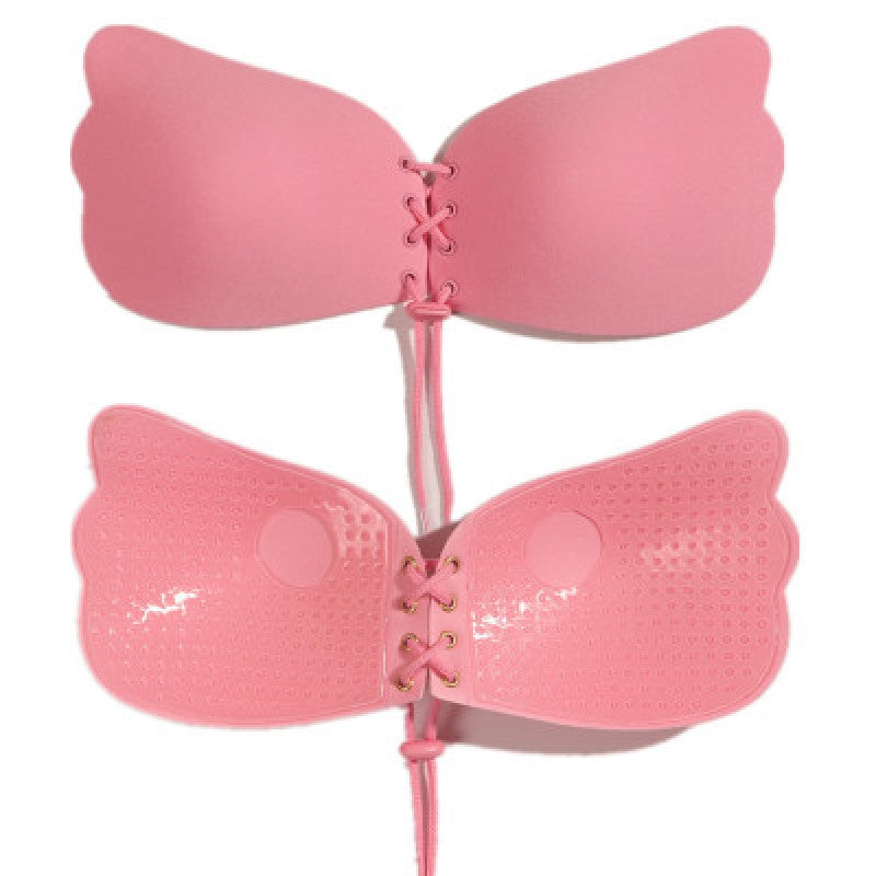 Pink strapless bra with scalloped cups and lace-up front ties