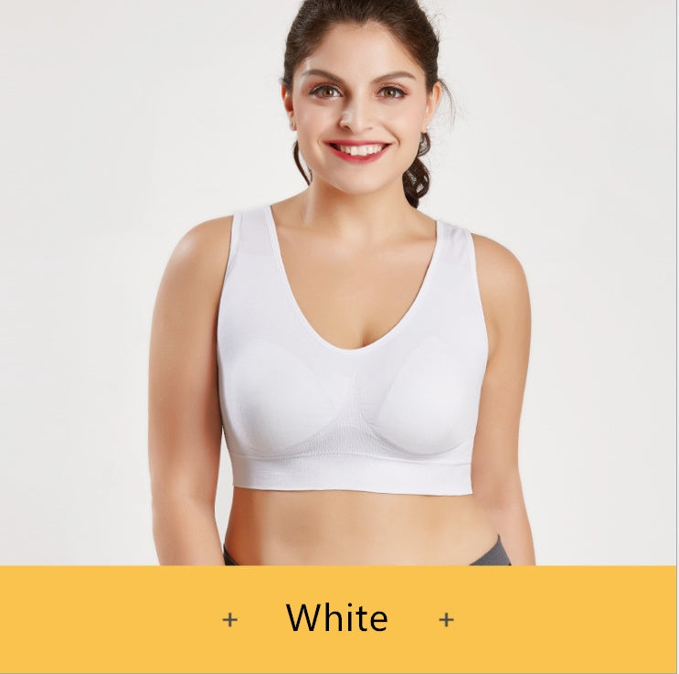 White sports bra with scoop neckline and smooth molded cups