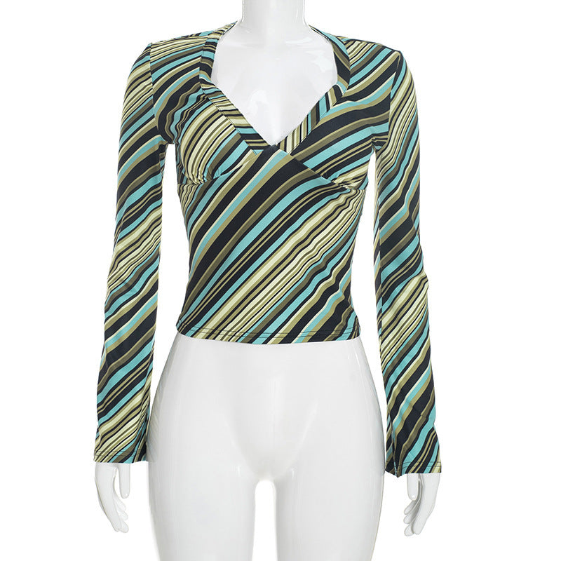 Green striped deep-V long-sleeve top on mannequin, wrap-style cross neckline