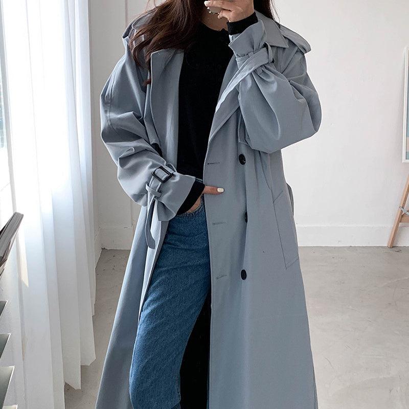 Women’s slate blue long windbreaker with hood, button front, and belt