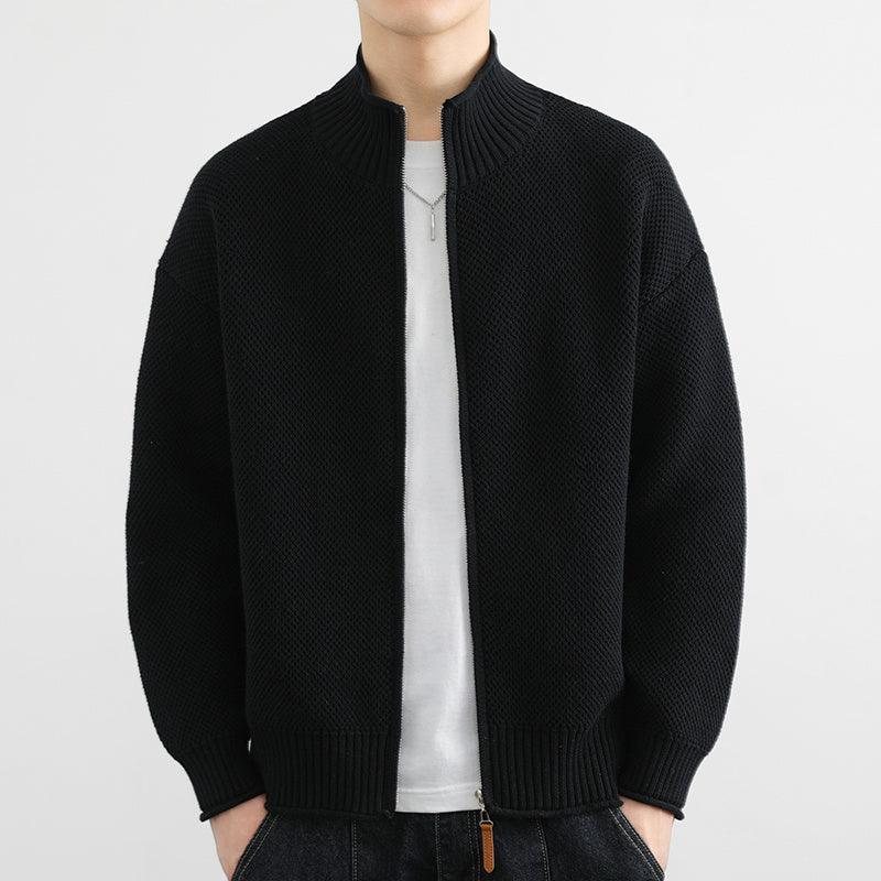 Black zip-front knit cardigan sweater with ribbed collar and hem