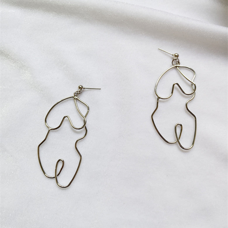 Exaggerated twisted body earrings - WOMONA.COM