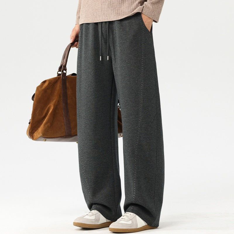 Men's loose drawstring pants, dark heather gray wide-leg fit with side pockets