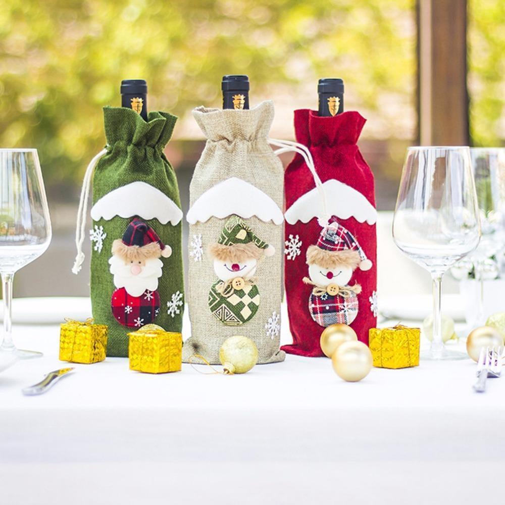 Set of Christmas wine bottle socks with Santa, snowman, and nutcracker designs in green/white/red