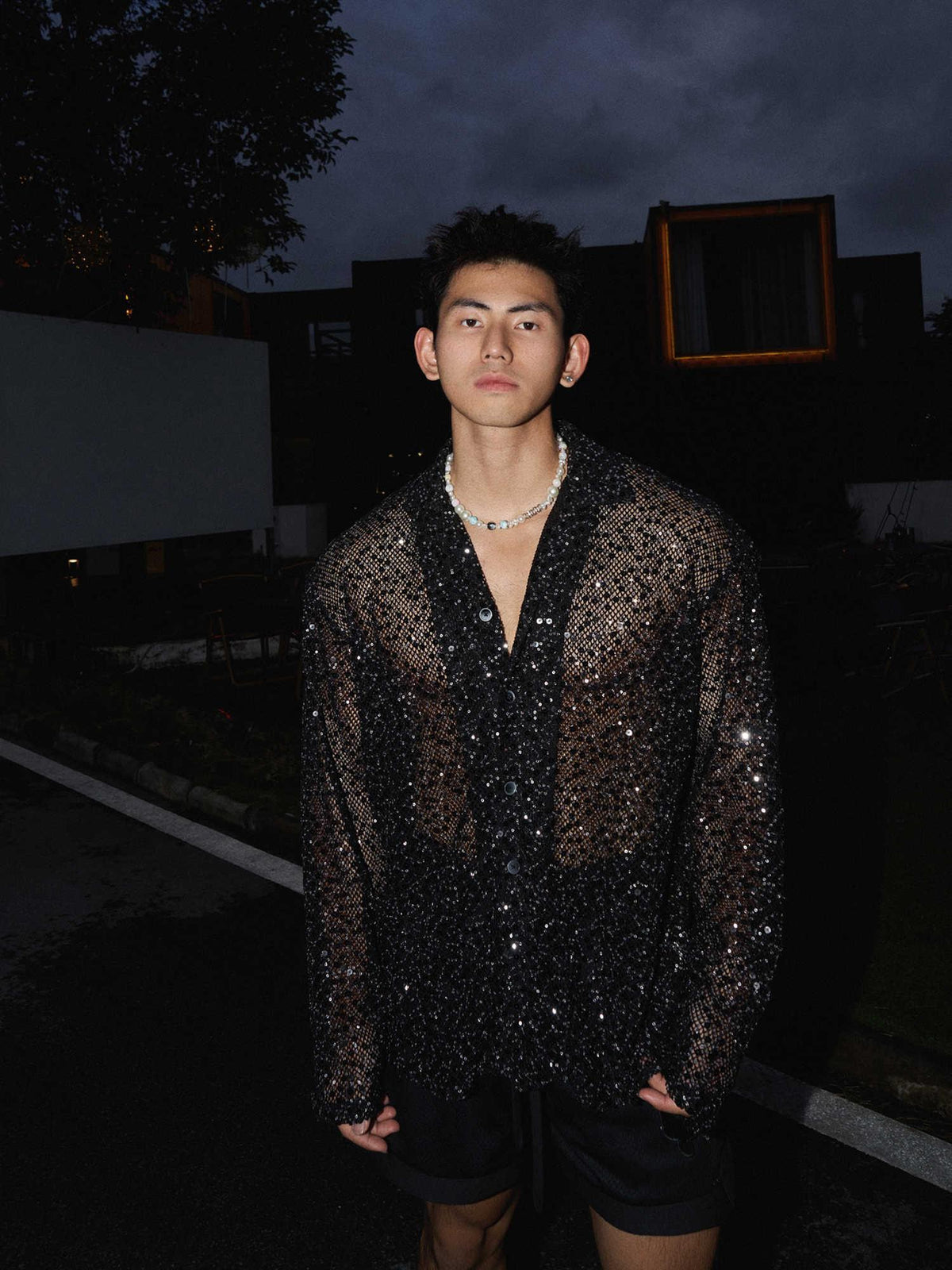 Black long-sleeve hollow-out sequin shirt with silver sparkle, V-neck button front
