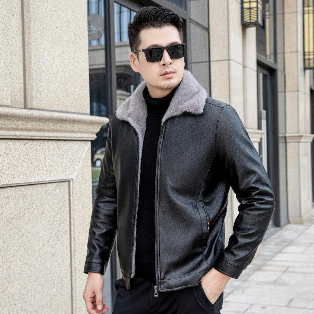 Men's black leather jacket with gray shearling collar, zip front, and side pockets