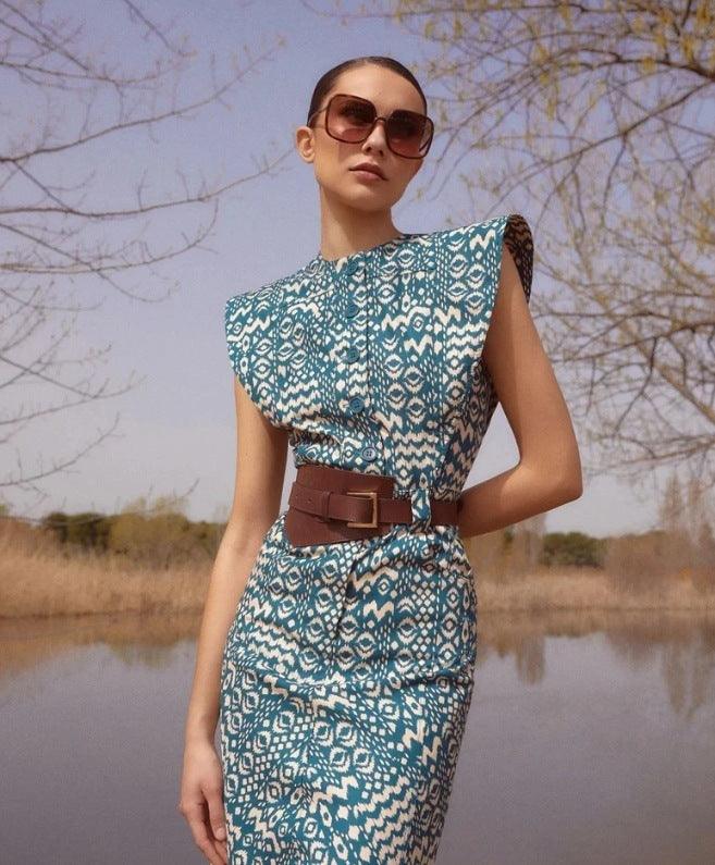 Peacock blue printed round-neck dress with cap sleeves and waist belt