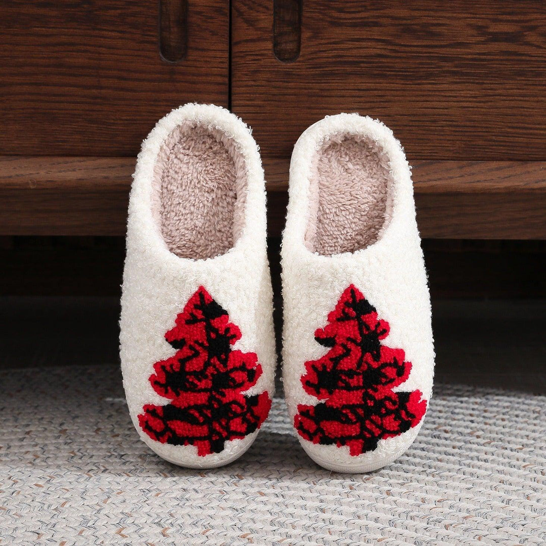 White plush slippers with red and black Christmas tree applique, cozy indoor slip-ons