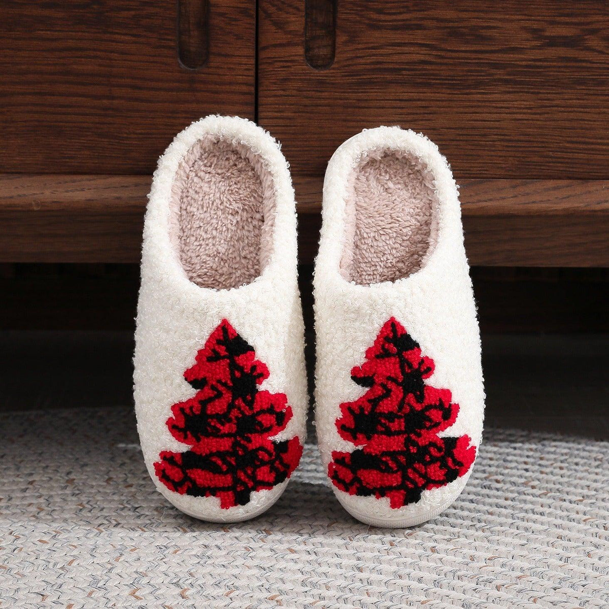 White plush slippers with red and black Christmas tree applique, cozy indoor slip-ons
