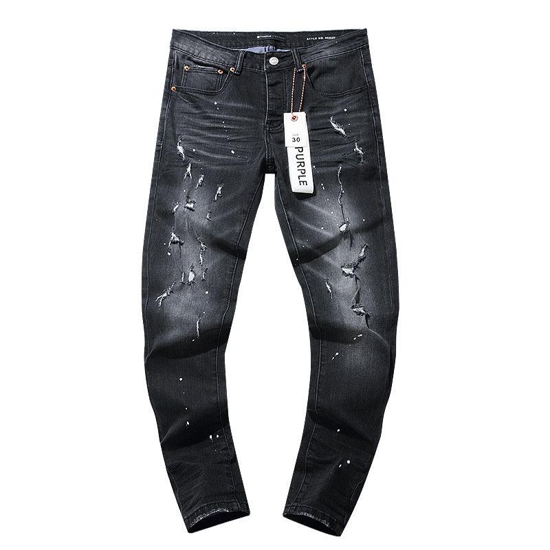 Distressed straight jeans in dark wash, button fly, ripped knees and scattered marks
