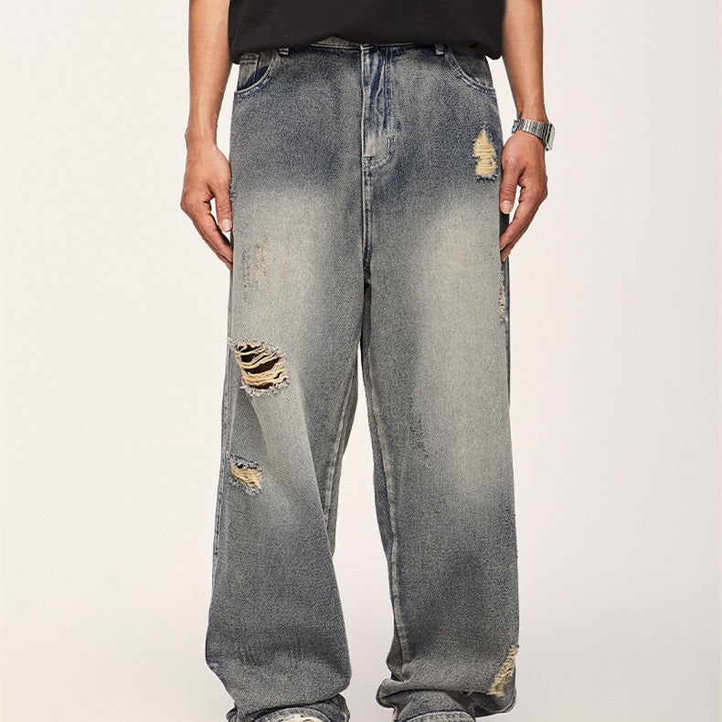 Jeans con agujeros lavados con agua de High Street Heavy Industry