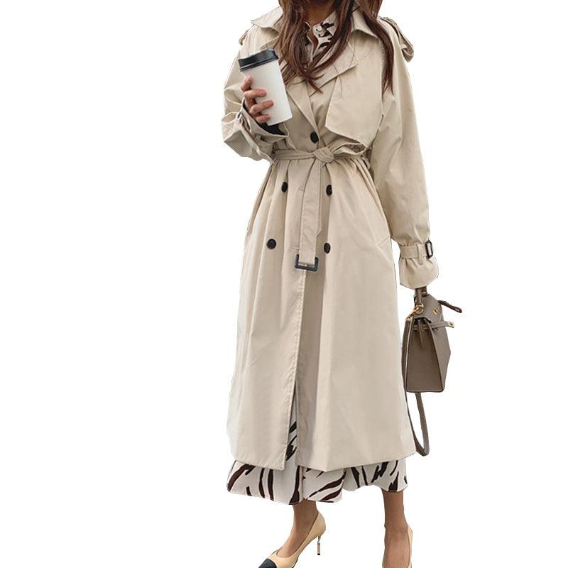Women’s light beige long windbreaker coat with hood, button front, and belted waist
