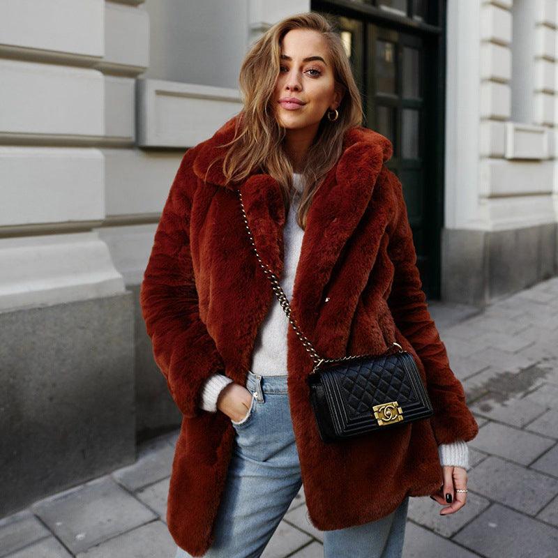 Rust-brown furry leisure coat with full zip front and relaxed, oversized fit